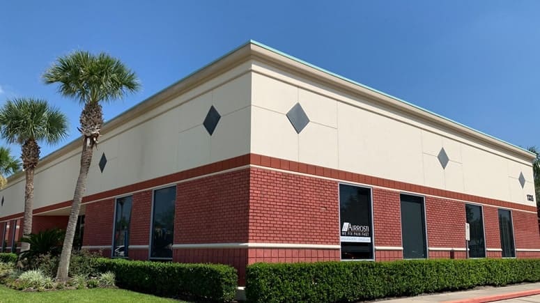 An exterior view of the building where Airrosti Space Center is located.