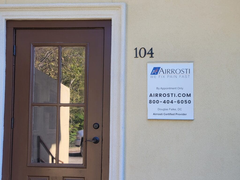 a close up of the exterior front door at Airrosti Nacogdoches