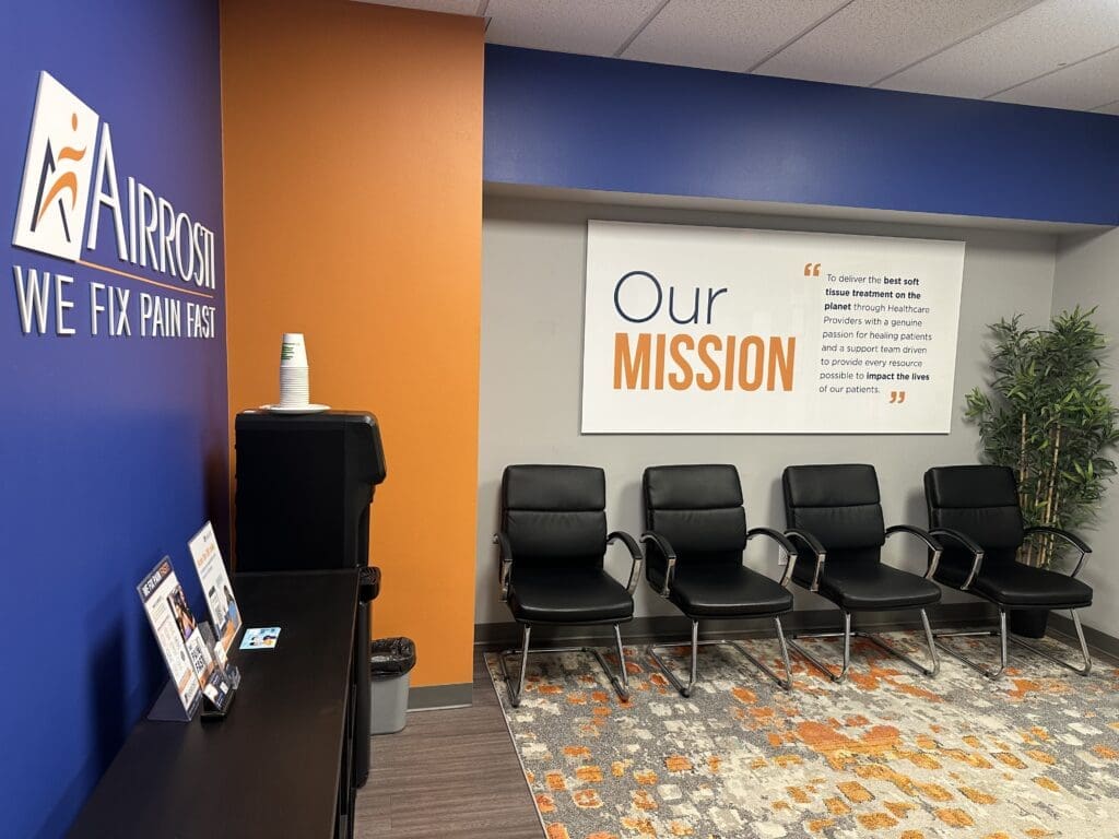Lobby at Airrosit West Plano. Mission Statement is decorating the wall.