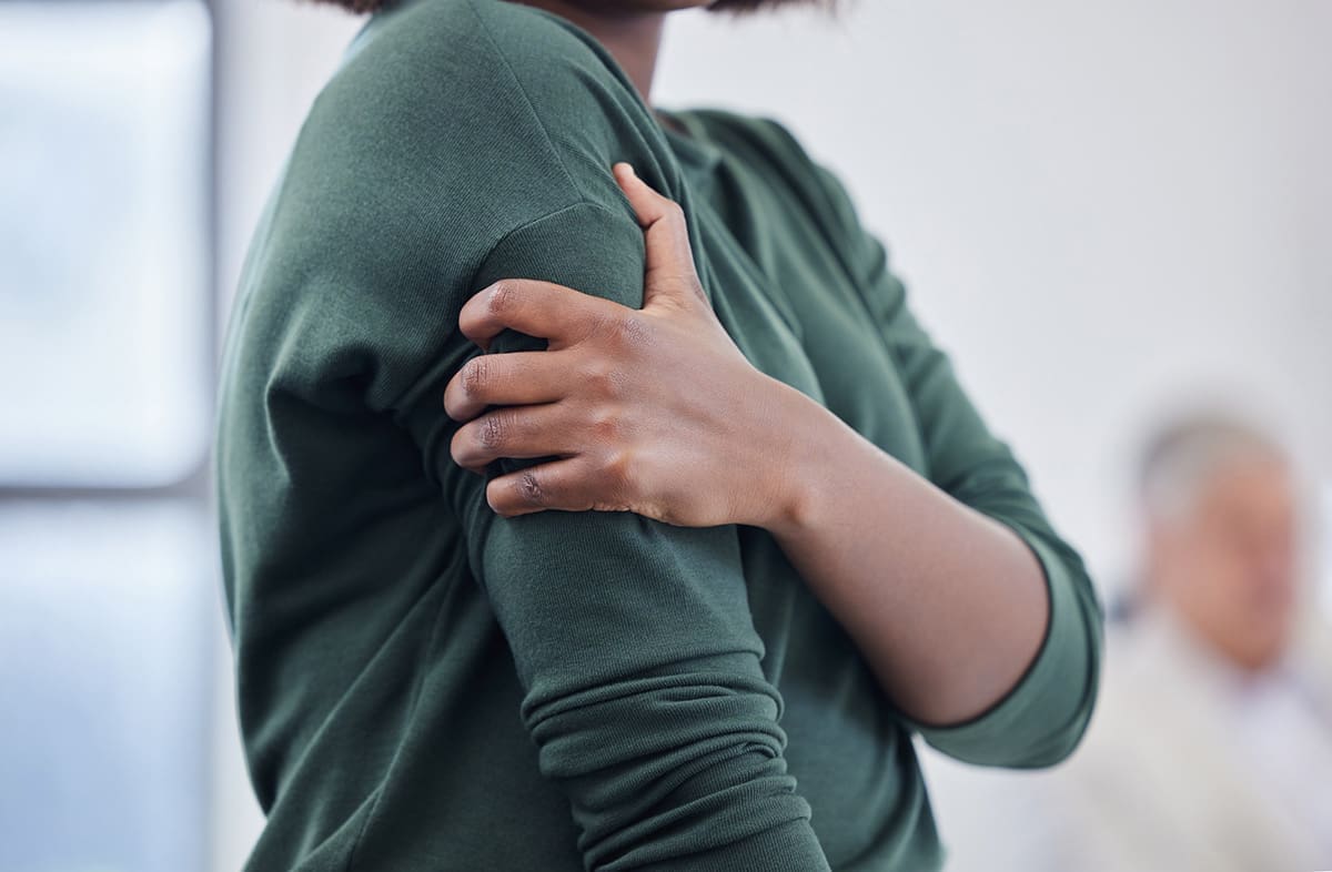 Woman with arm pain