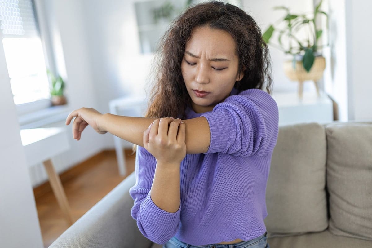 Woman with elbow pain