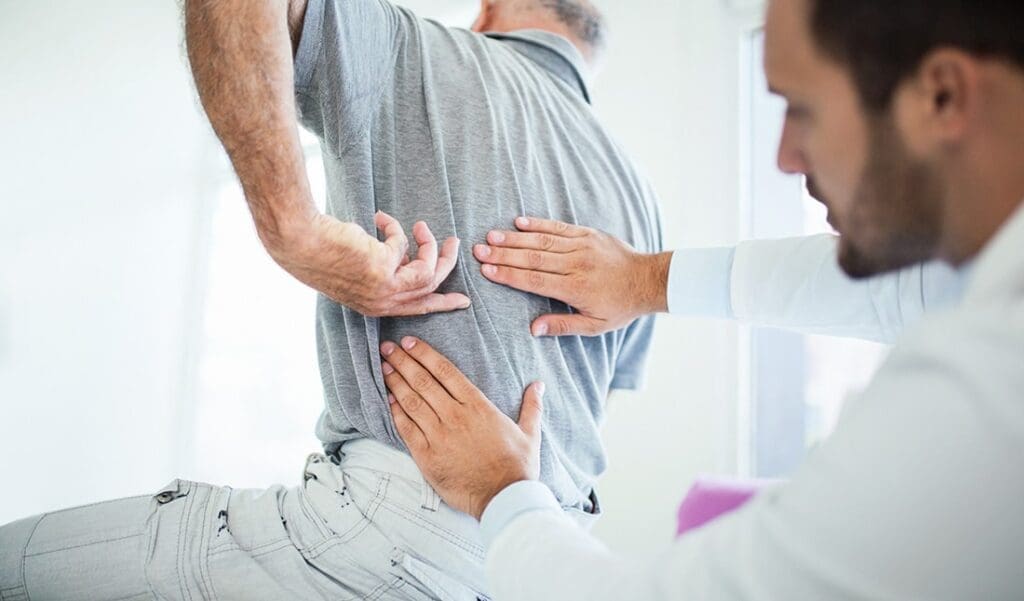 Patient with middle back pain