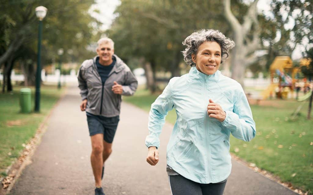 older couple running