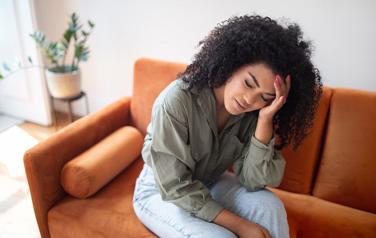 Woman with migraine